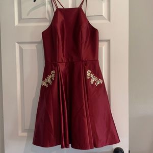 Prom or wedding dress. Blondie Nites formal dress with beads.  Burgundy/red.